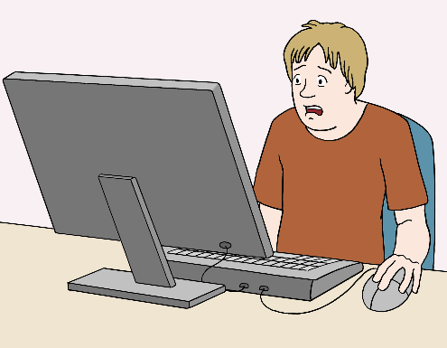 Eine erschrockene Person vor einem Computer.
