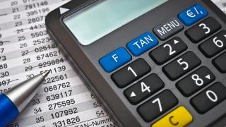 Ein TAN-Rechner mit einem Kugelschreiber